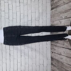 Jonathan Simkhai Lace up Stove Pipe High Rise Skinny Jeans in Faded Black Wash